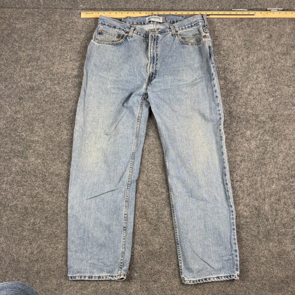 Levi's Jeans Mens Size 38x32 Light Wash Blue 550 Relaxed Fit Denim Ripped Loop